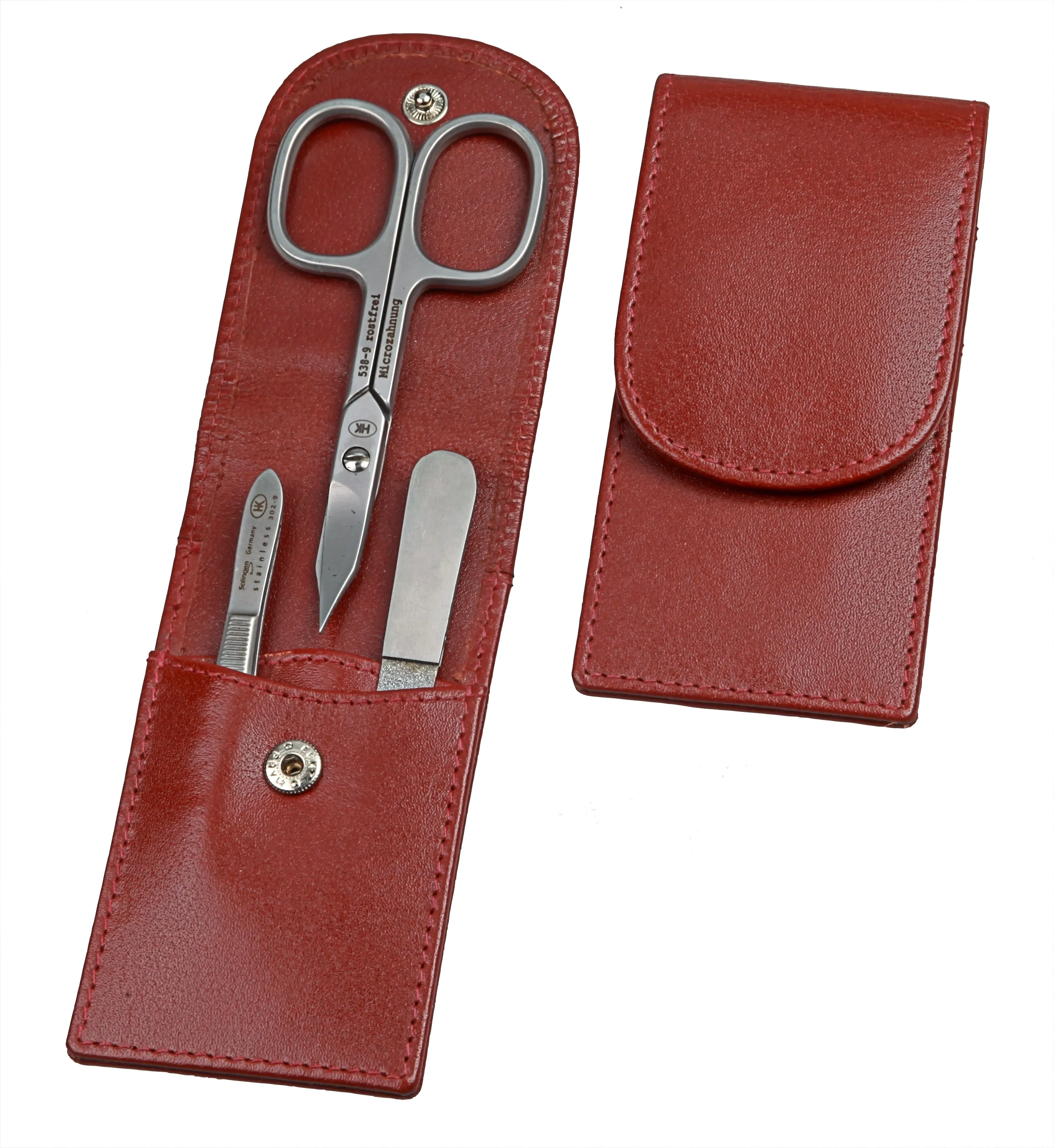 pocket sized manicure set: 3 implements, stainless steel; buff leather, brown pocket sized manicure set: 3 implements, stainless steel; buff leather, brown