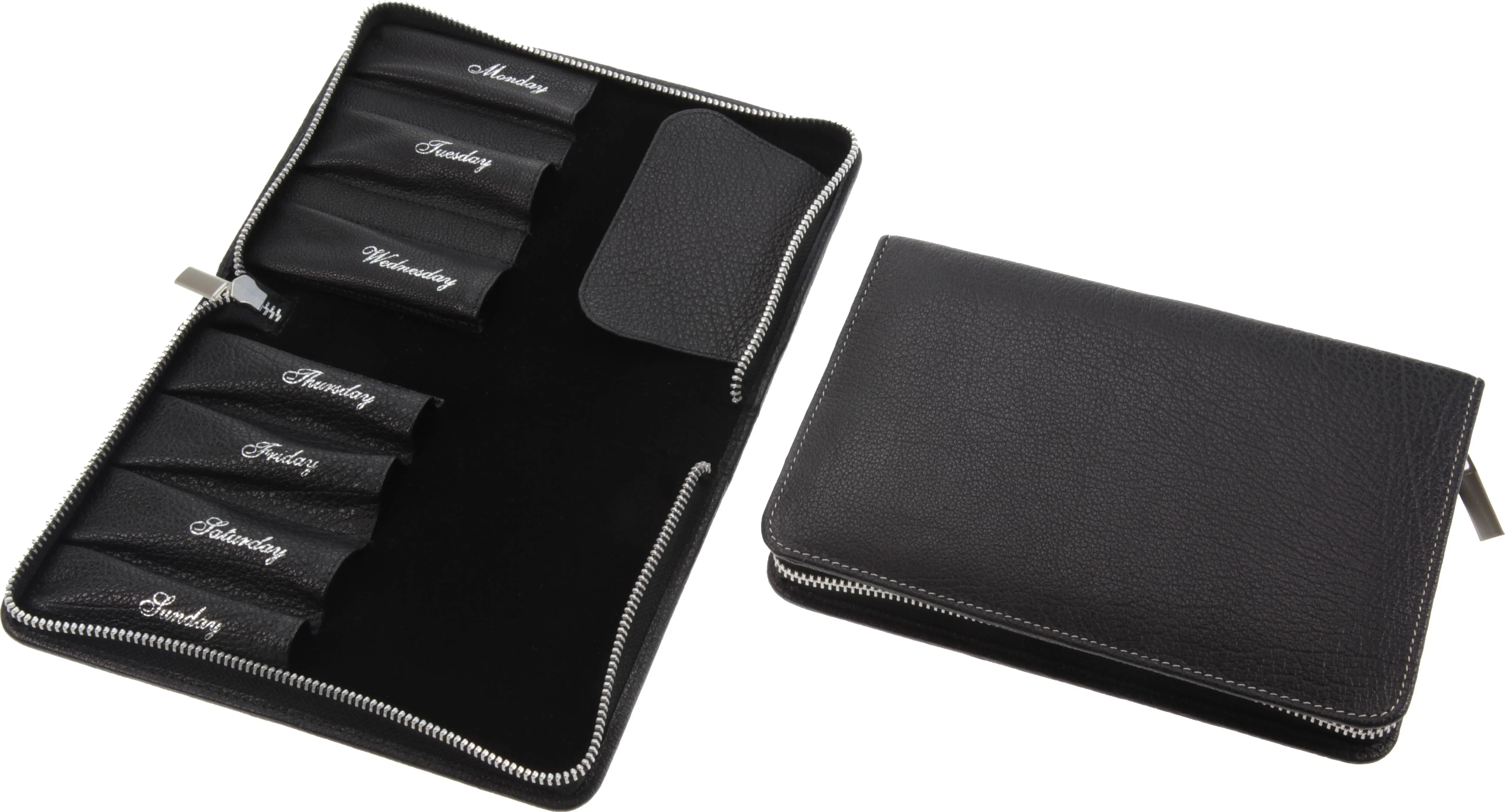 Etui für 7 Rasiermesser, mit Wochentagen geprägt; Metall-Reißverschluss, schrumpfgegerbtes Büffelleder, schwarz mit heller Kontrastnaht Etui für 7 Rasiermesser, mit Wochentagen geprägt; Metall-Reißverschluss, schrumpfgegerbtes Büffelleder, schwarz mit heller Kontrastnaht