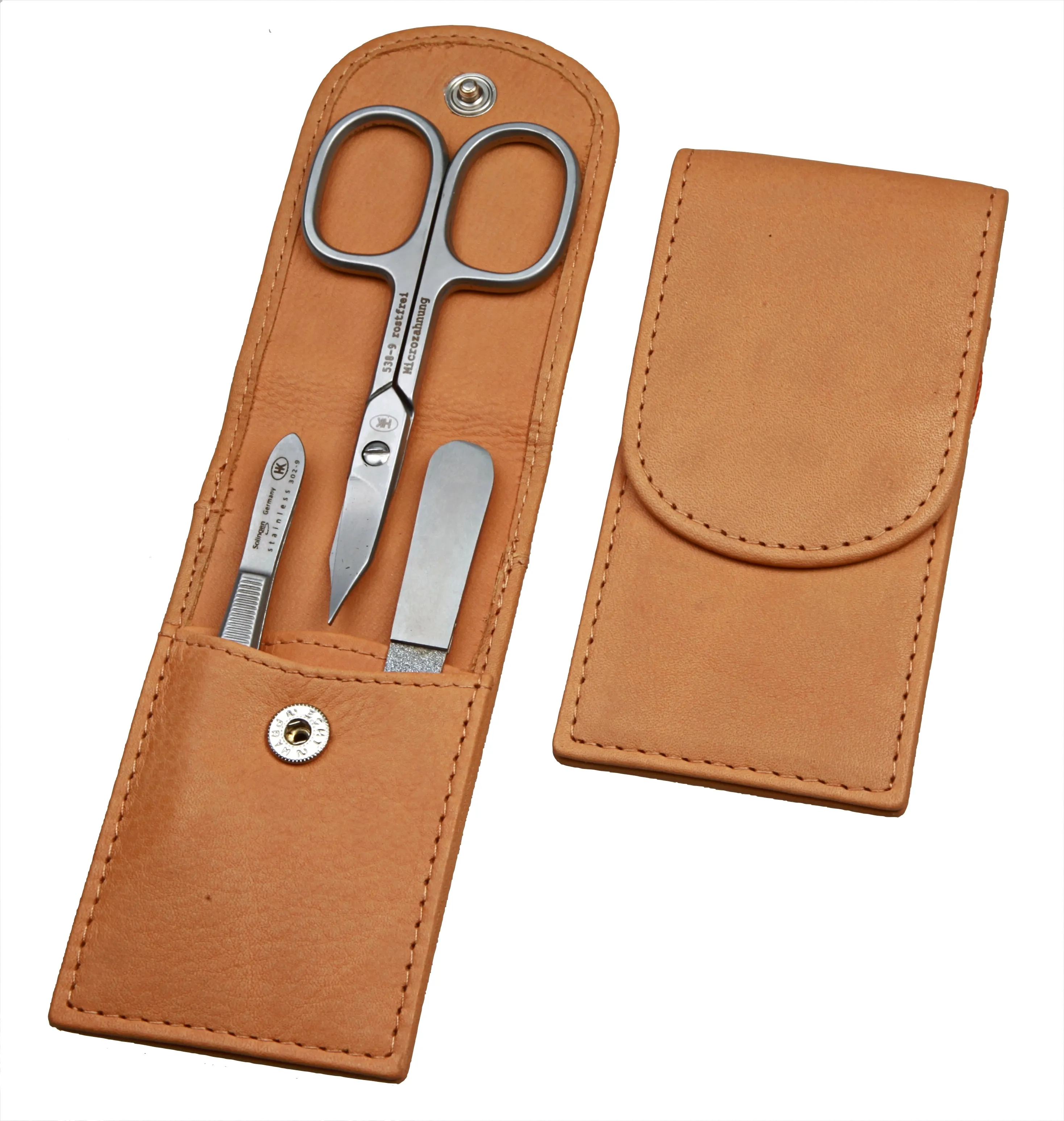 pocket sized manicure set: 3 implements, stainless steel, mat finish; fullgrain cowhide, sand pocket sized manicure set: 3 implements, stainless steel, mat finish; fullgrain cowhide, sand