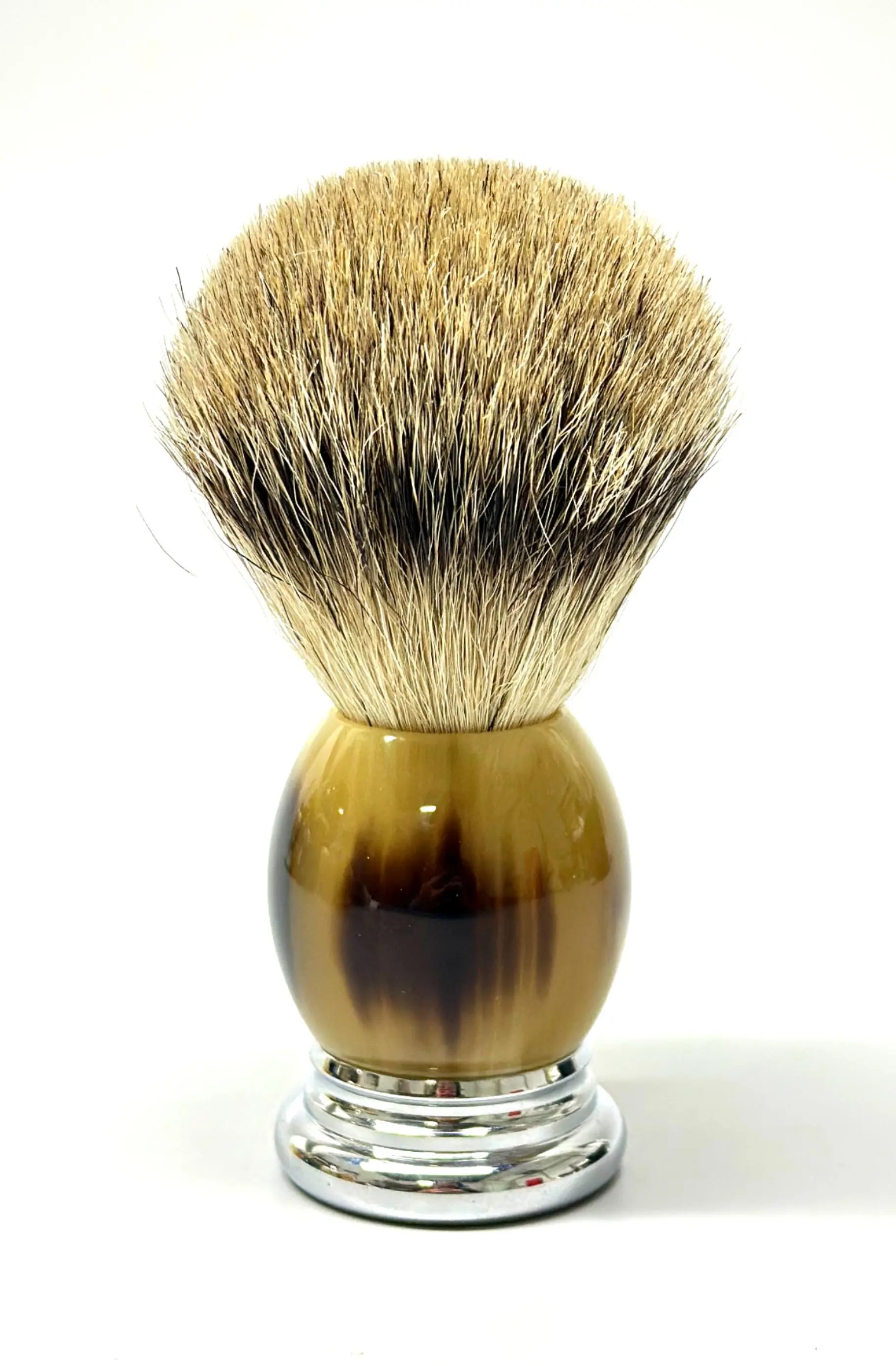 Shaving brush, genuine badger "silvertip", plastic handle, faux horn with metal base, mirror-polished Shaving brush, genuine badger "silvertip", plastic handle, faux horn with metal base, mirror-polished